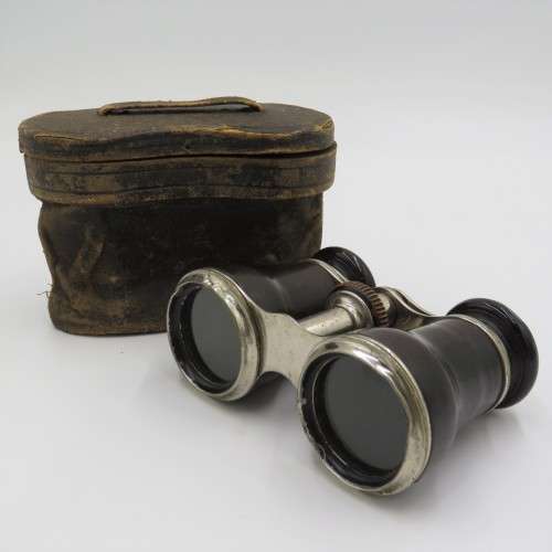 Binoculars Antique pair of opera binoculars with leather pouch for